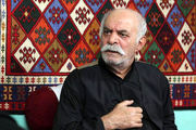 مرحوم سیروس گرجستانیدر آغوش فرزندش /عکس
